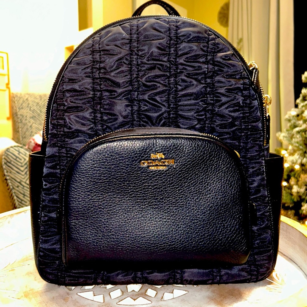 Mini Coach mini Backpack. Navy blue 
Like new beautiful bag. No wear a tear